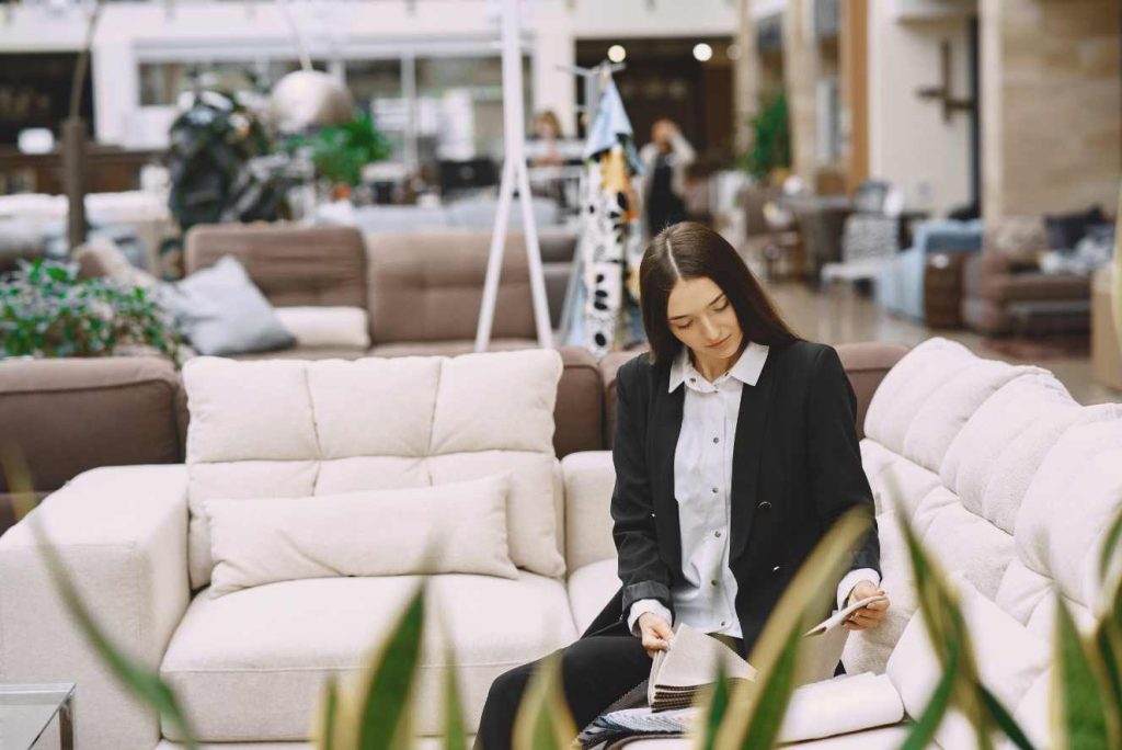woman-customer-looking-beautiful-fabric-drapery-shop